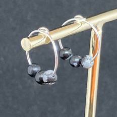 Tiny sterling silver snowflake obsidian hoop earrings