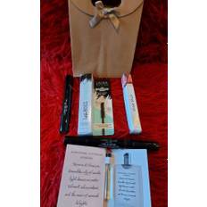 Laura geller full size gift set: mascara, dual eyeliner, lipsticknew with bag