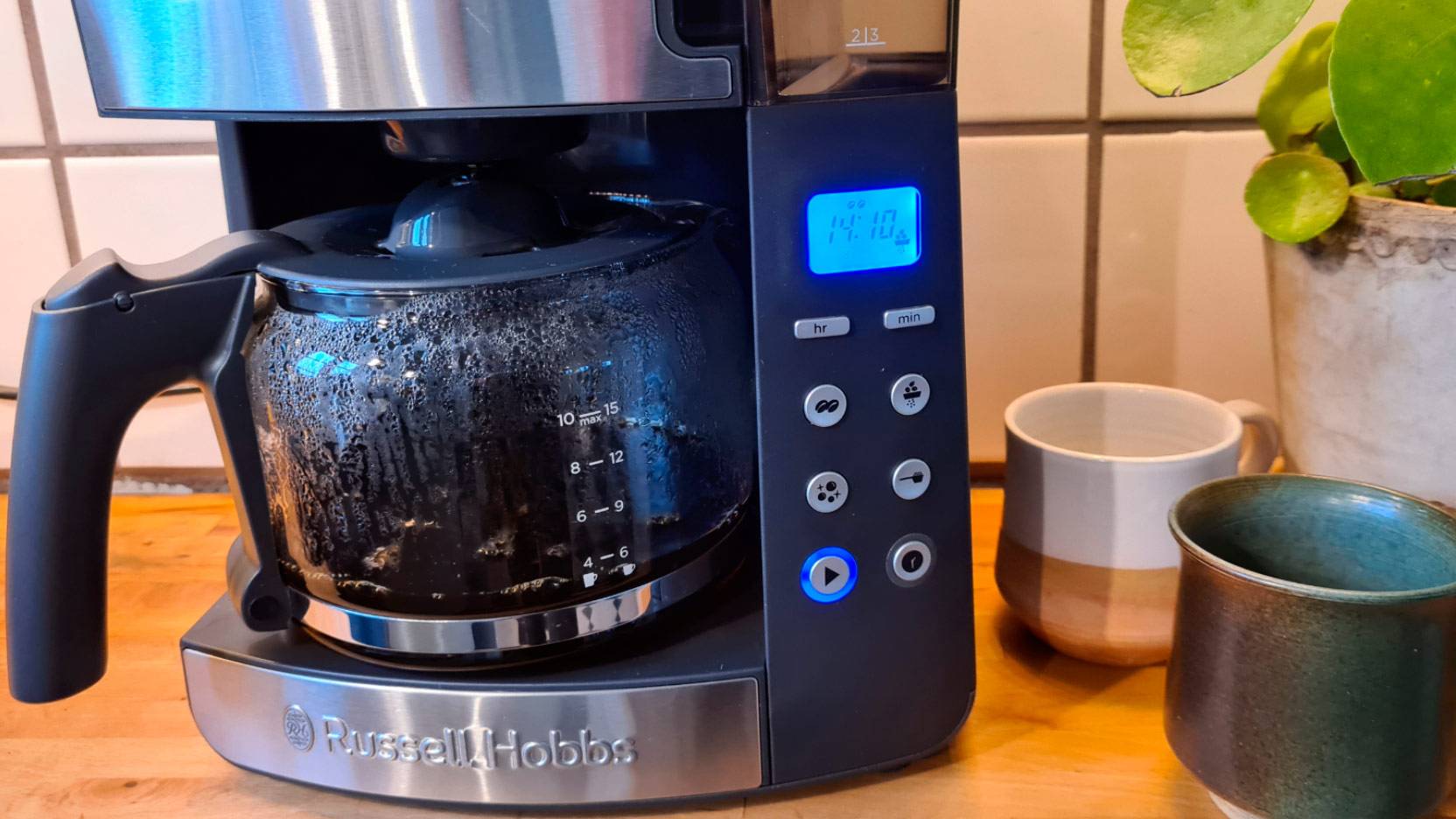 Image of Russell Hobbs Grind and Brew, brewing a jug of coffee