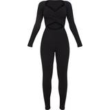 V-Neck Jumpsuits & Overalls PrettyLittleThing Rib Cross Over Long Sleeve Jumpsuit - Black