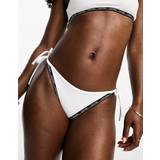 Calvin Klein Women Swimming Trunks Calvin Klein core logo tape string side tie bikini bottom in white