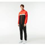 Lacoste Jumpsuits & Overalls Lacoste Tennis Trainingsanzug in Regular Fit Orange Schwarz Weiß