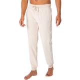 Tommy Hilfiger Joggers - Men Trousers Tommy Hilfiger Lounge Track Rib Velour Joggers Cashmere Creme
