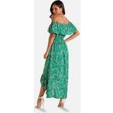 MELA Green Ditsy Floral Frill Dip Hem Maxi Dress New Look