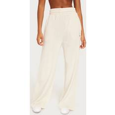 Trousers Puma relaxed sweatpants in white White XSml