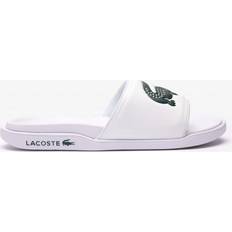 Lacoste Women Slippers & Sandals Lacoste SERVE SLIDE DUAL 09221CMA white male Sandals & Slides now available at BSTN in