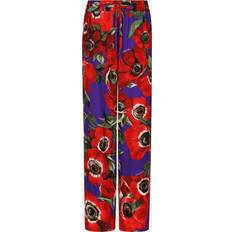 Florals - Women Trousers & Shorts Dolce & Gabbana Flared charmeuse pants anemoni_fdo_viola